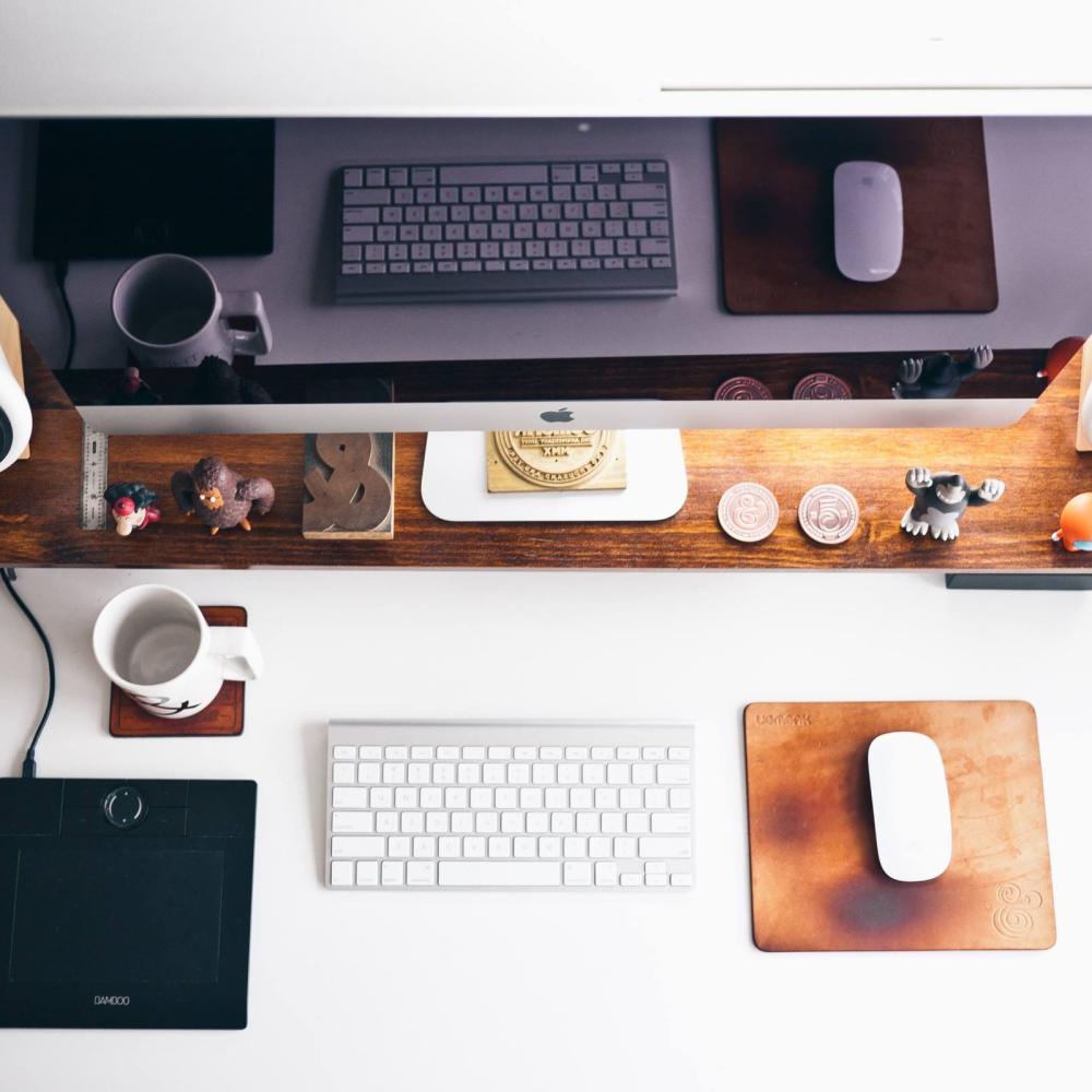 desk with computer and keyboard
